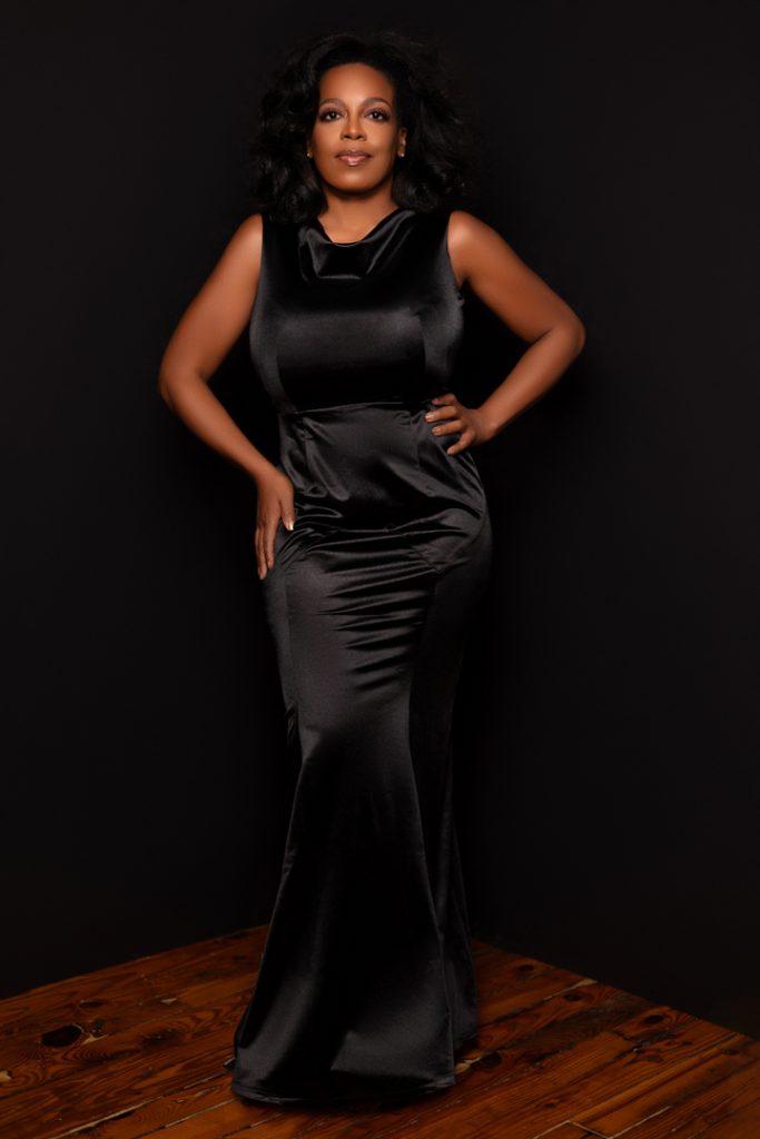 black woman in black gown luxury portrait session by atlanta photographer Laquel Wright Photography